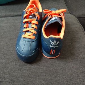 Navy and orange Adidas